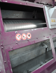 Opened Magnetic Separator/Windsifter: Cylinders and abrasive veil can be seen