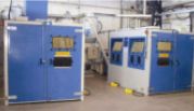 Booth for Aluminium Oxide blast treatment with walk-in (left), workstation and internal lance capabilities (right)