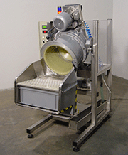 Picture 1: Example of a small disc- finishing unit of 50 liters, including microfluid dosing station and final separating sieve, with automatic reloading of the finishing media