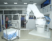 The EcoRP L033 painting robot being used for hands-on training at the new training centre