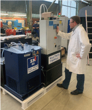 Dr. Andreas Funk adjusting a ZM 03 basket centrifuge
