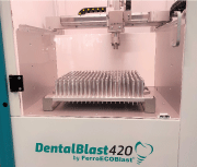 Figure 2: Automatic treatment of dental implants with DentalBlast 420 by FerroECOBlast®, a machine with capacity to process 120 implants an hour