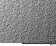 Figure 2: SEM image of TA6V sample after shot peening with 100µm high density ceramic bead Microshot YZ100 at Almen intensity of 0.10mm N