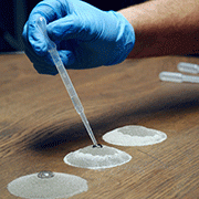 Water-drop test used to detect oil and grease contamination in the abrasive mix