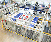 The fully automated polishing cell consists of two tub vibrators, a workpiece cleaning system, a workpiece loading/unloading station, and a fully automatic process water cleaning centrifuge, model Z 1000. Transport of the workpiece mounting frame is handled by a gantry crane system