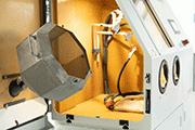 Basket automation for mass sandblasting treatment