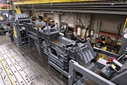 Accumulation conveyor with gate and indexing weigh feeders