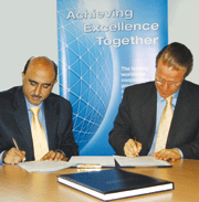 Arshad Hafeez, Director of Global Business Operations for Industry Managed Programs, Research & Development at PRI (left) and Steven  Baiker, Publisher MFN (right) during the meeting, signing the agreement.