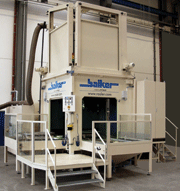 This shot peening system with two load/unload stations is equipped with two independent blast systems and 2 x 4-axis gantries guiding the blast guns. This allows the simultaneous peening of the inside and outside surface of the parts.